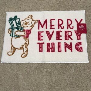 Brand New Winnie the Pooh Holiday Bath Rug. 20” x 30”. Super soft, thick pile.